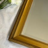 Large vintage gilded wooden mirror