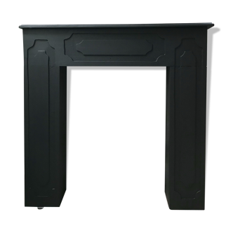 Blackened wooden mantel