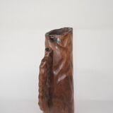 carved wooden pitcher