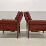 Fauteuils lounge danois vintage en palissandre et cuir. Années 1960.