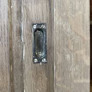 Large row of solid oak loom sliding doors