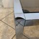 Square coffee table with smoked glass top and chrome base an70