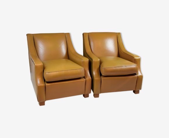 Pair of brown leather armchairs