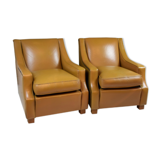 Pair of brown leather armchairs