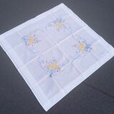 Embroidered tablecloth and table runner