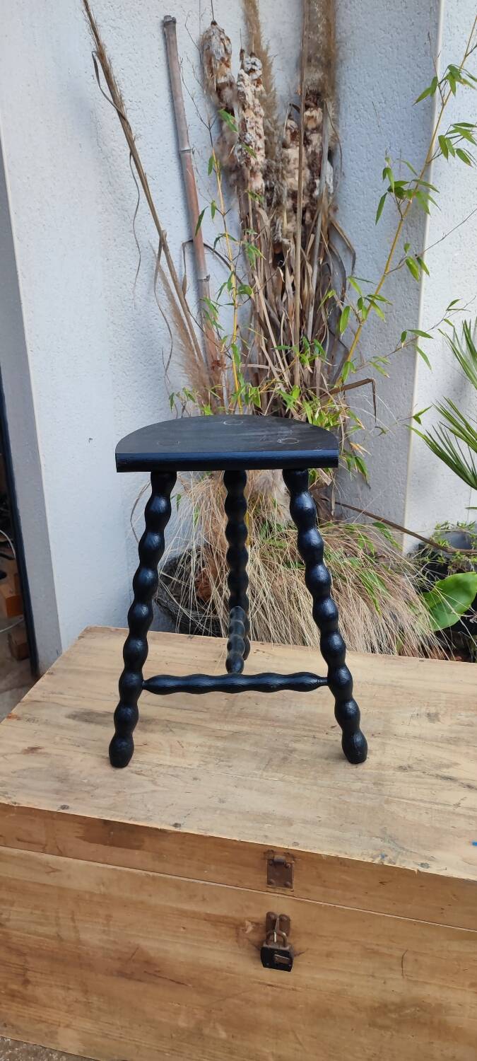 Low black stool