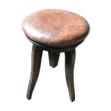 Old leather rotating piano stool