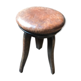 Old leather rotating piano stool