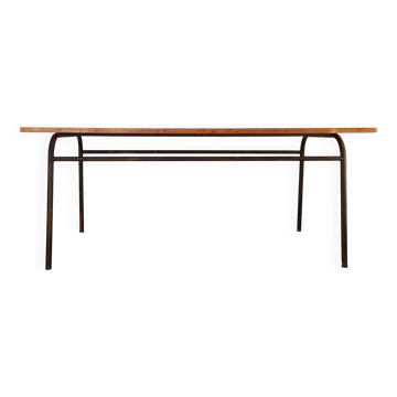 Metal tubular leg table with a wooden top.