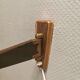 Wall lamp with adjustable ‘arm’ in copper and rosewood, with white shade.