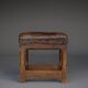 Petit tabouret en cuir par Gordon Russell pour Russell & Sons. Années 1920
