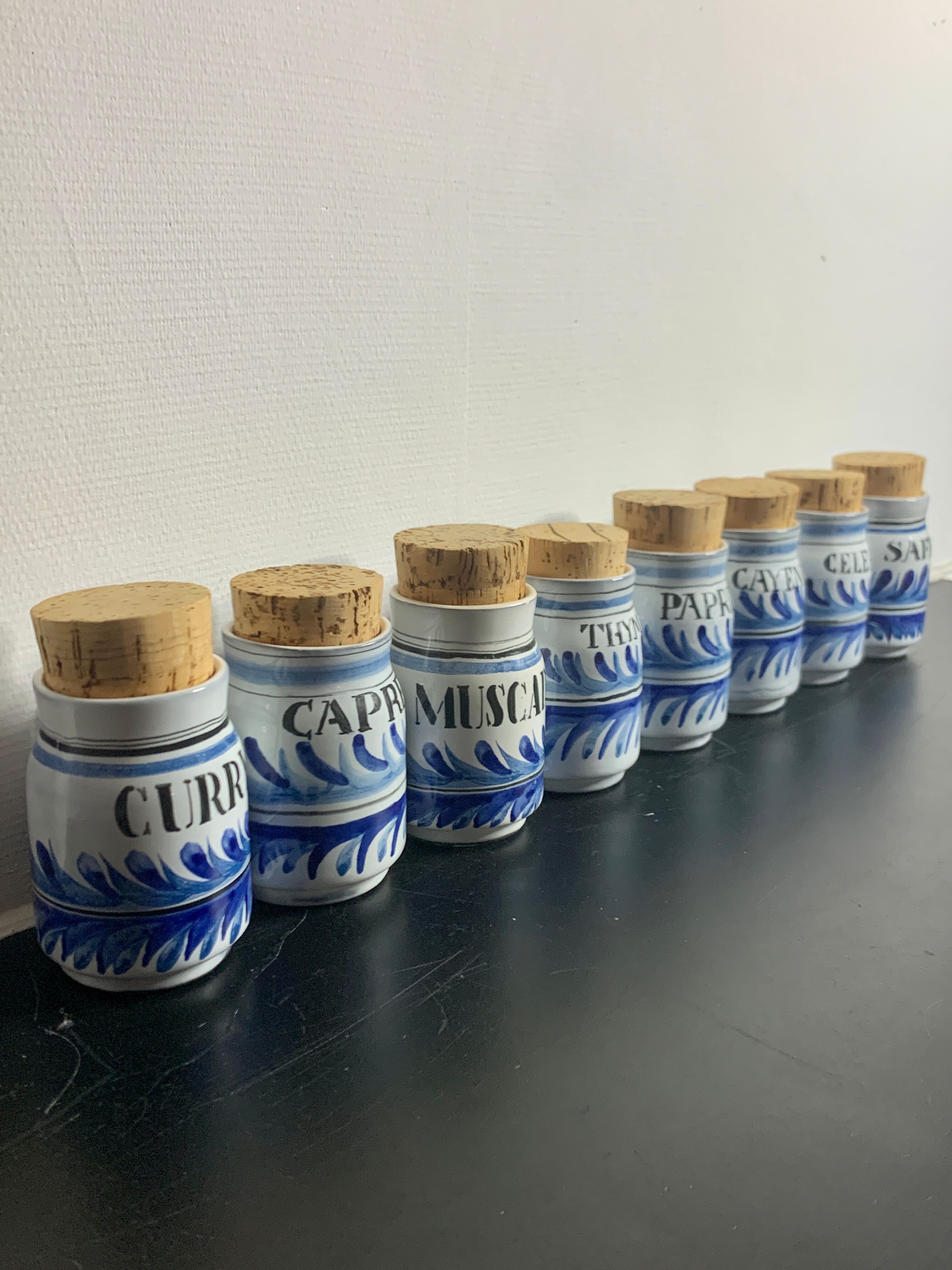 Set of 8 ceramic spice pots by Roger Capron