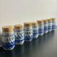 Set of 8 ceramic spice pots by Roger Capron