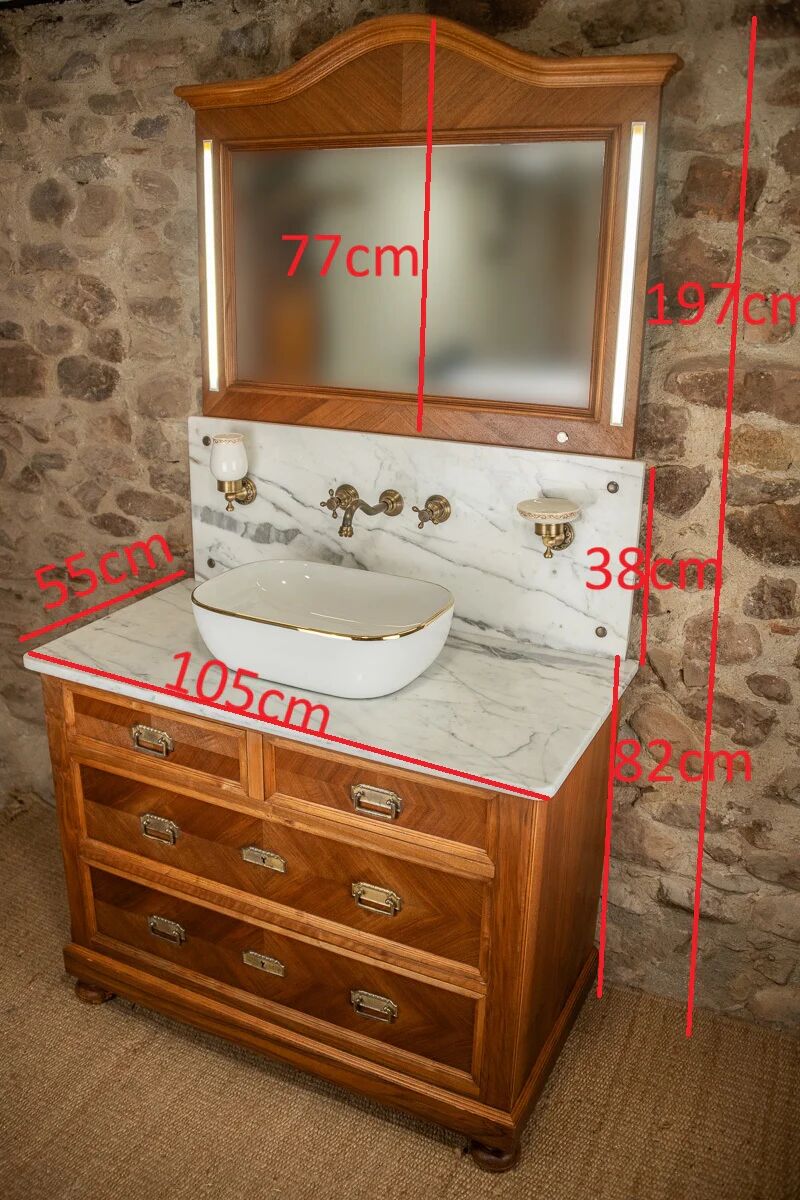 Antique washbasin cabinet from 1928 in wood and marble with a lighted mirror.