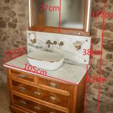 Antique washbasin cabinet from 1928 in wood and marble with a lighted mirror.