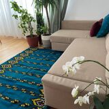 Romanian handwoven carpet with blue ground and yellow details