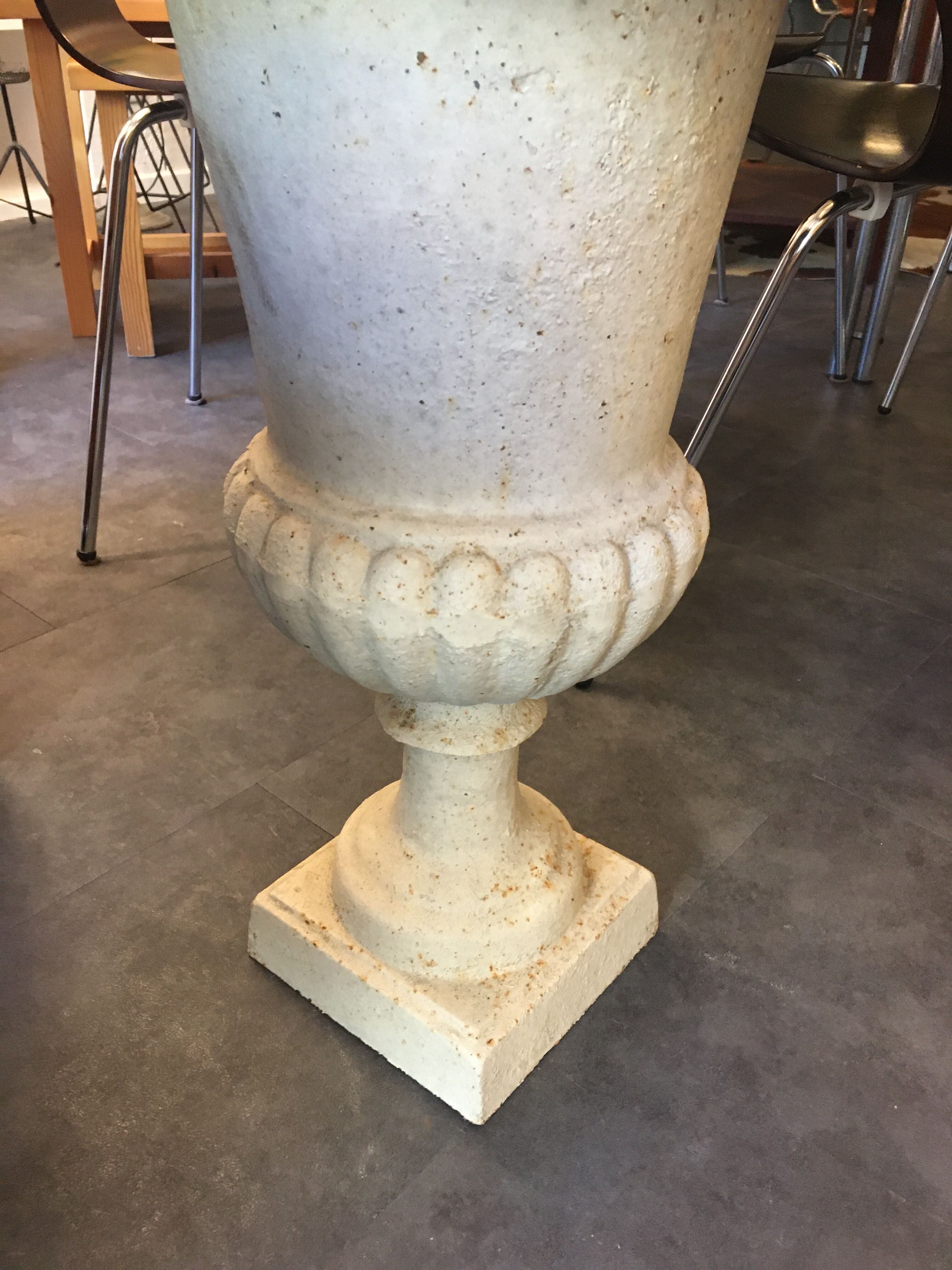 Pair of medicid vasques, cast, exterior