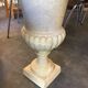 Pair of medicid vasques, cast, exterior