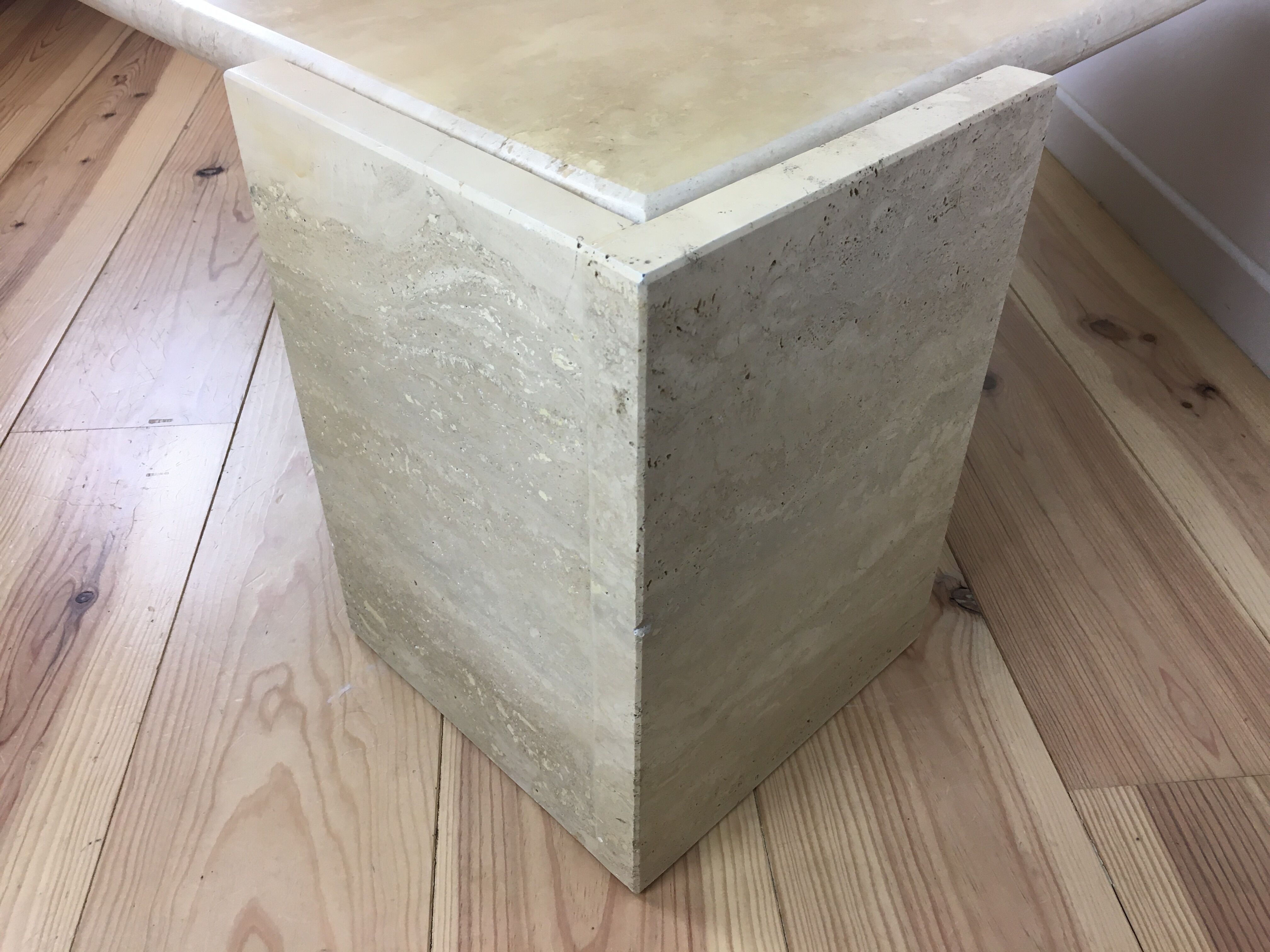 Bass table in travertine Roche Bobois
