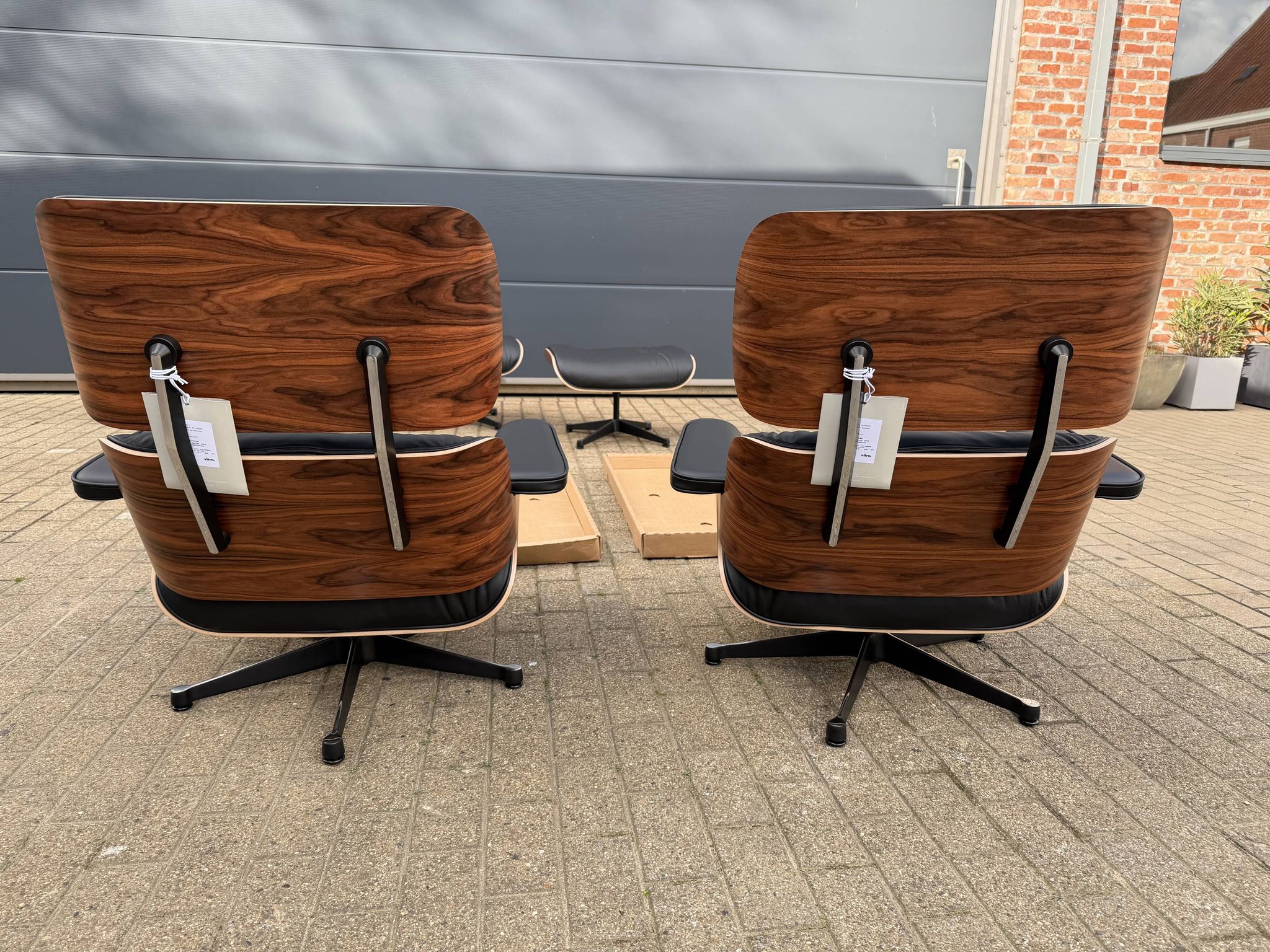 Vitra Eames Lounge chair XL + Ottoman, Zwart leder & Santos Palissander
