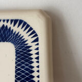 Vintage old trivet Badonviller blue graphic pattern