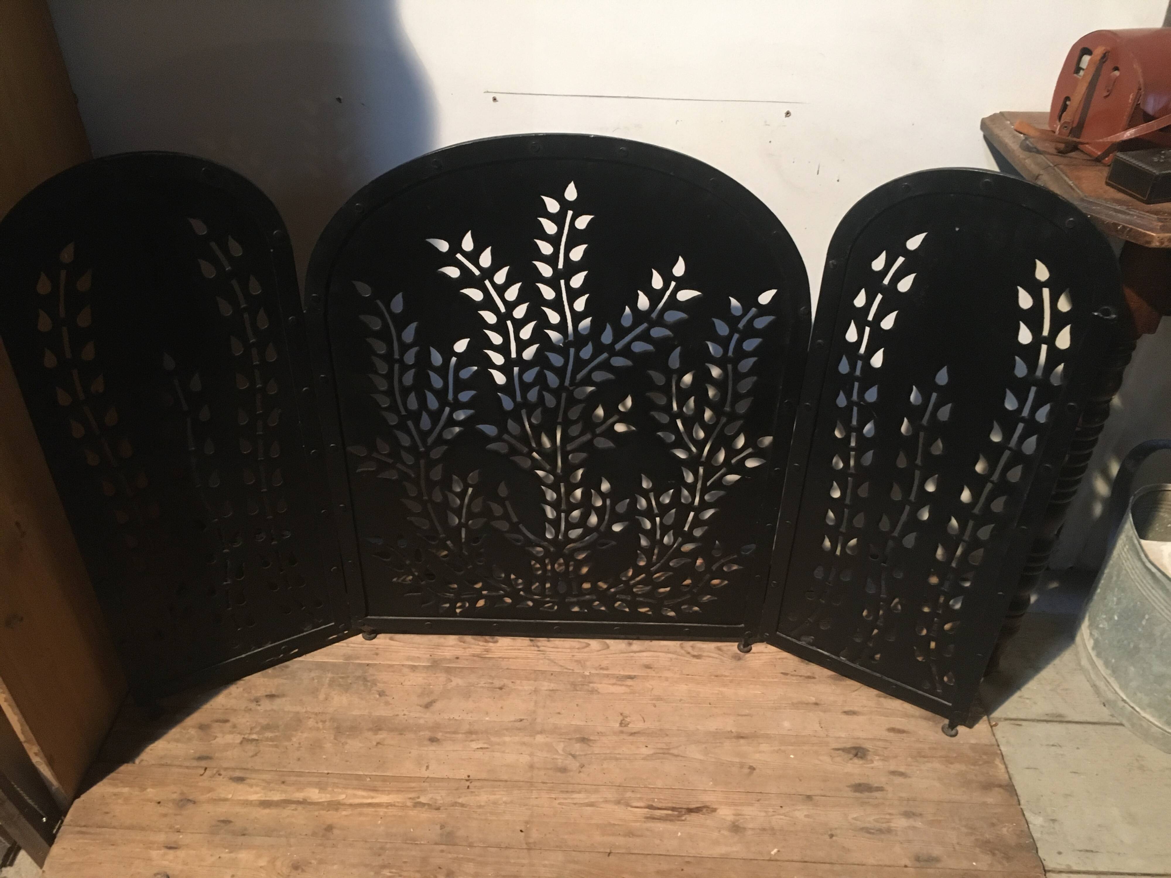 Wrought and cut metal fire screen