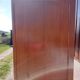 Vintage wardrobe with mirror and tapered legs.