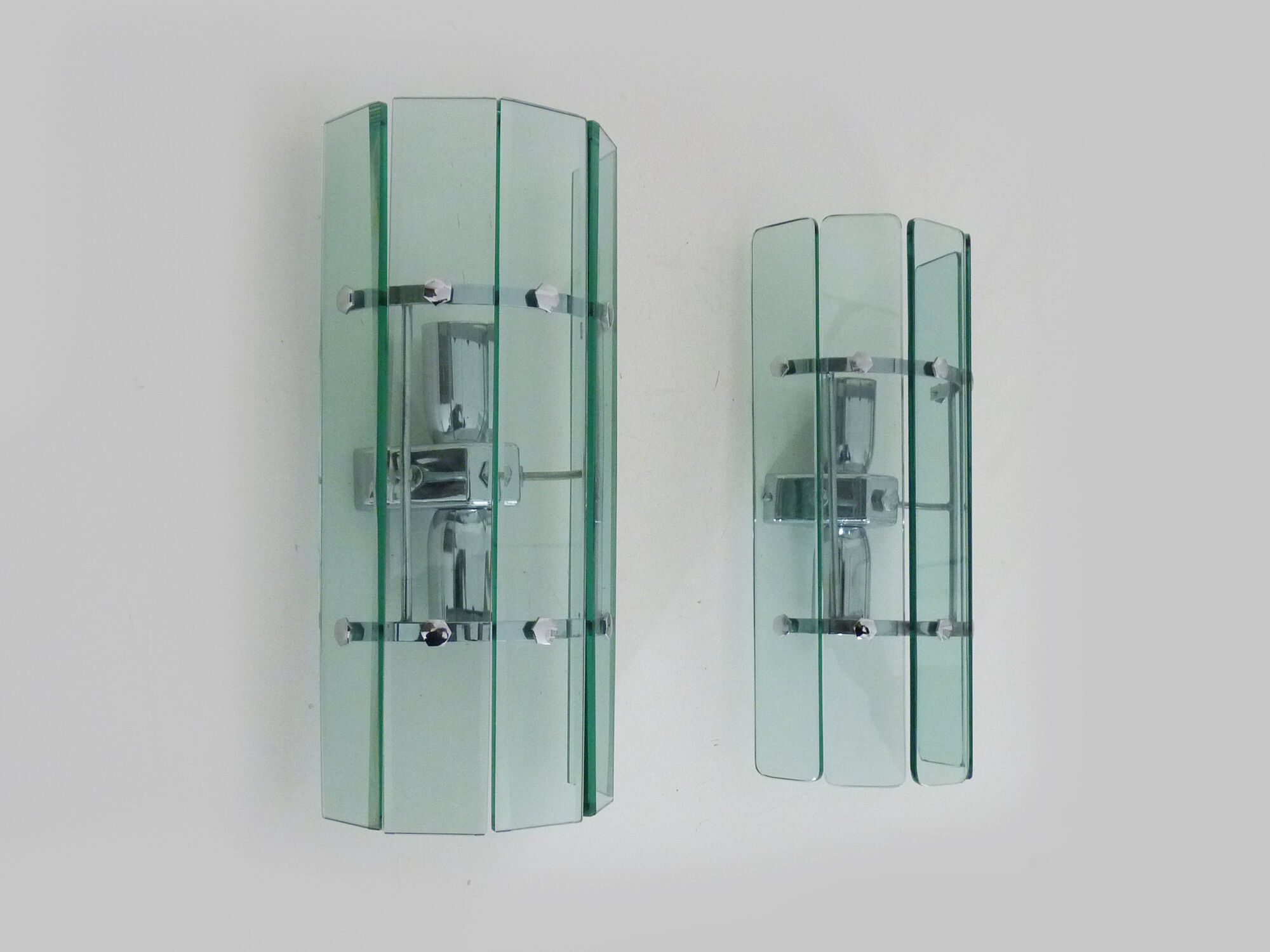 Pair of Italian Veca wall lamps in bluish glass, chrome, double lights