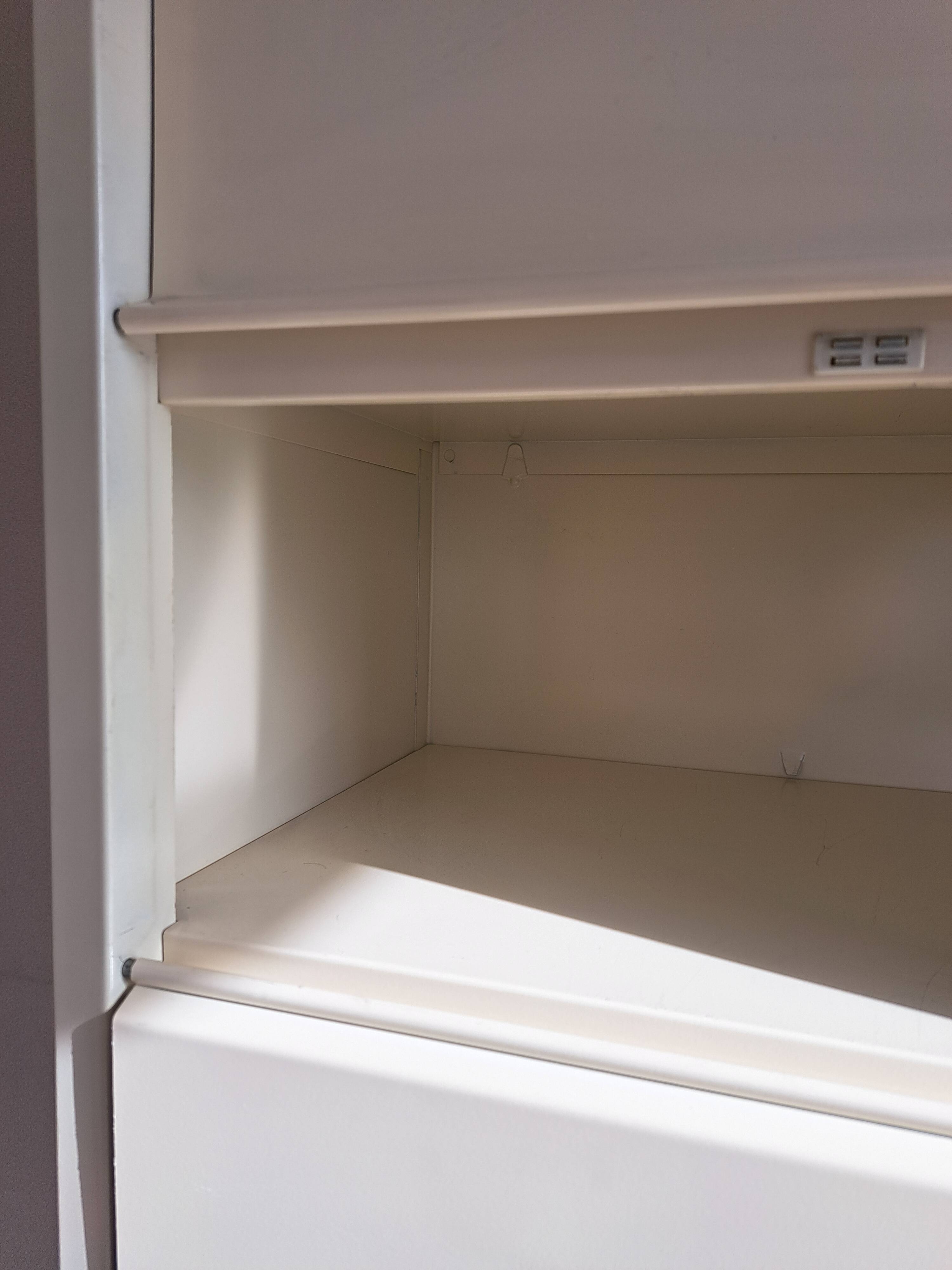 Vintage metal clamshell cabinet