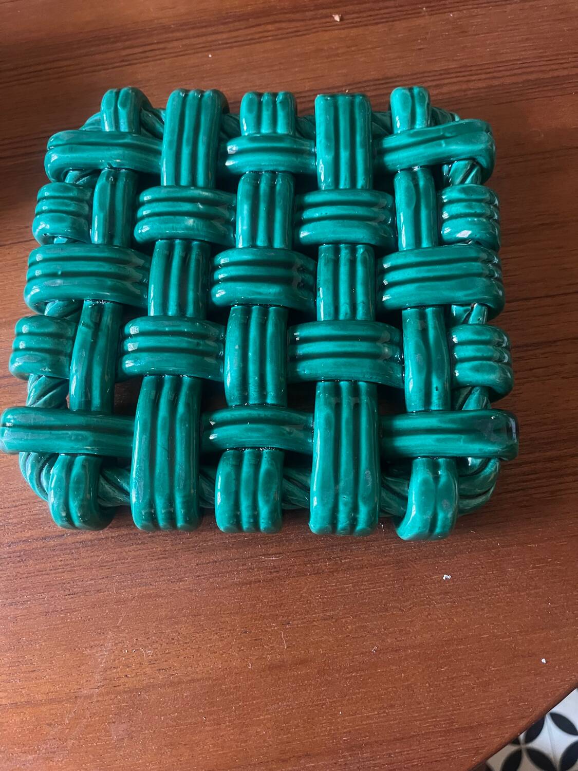 Woven ceramic trivet