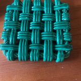 Woven ceramic trivet