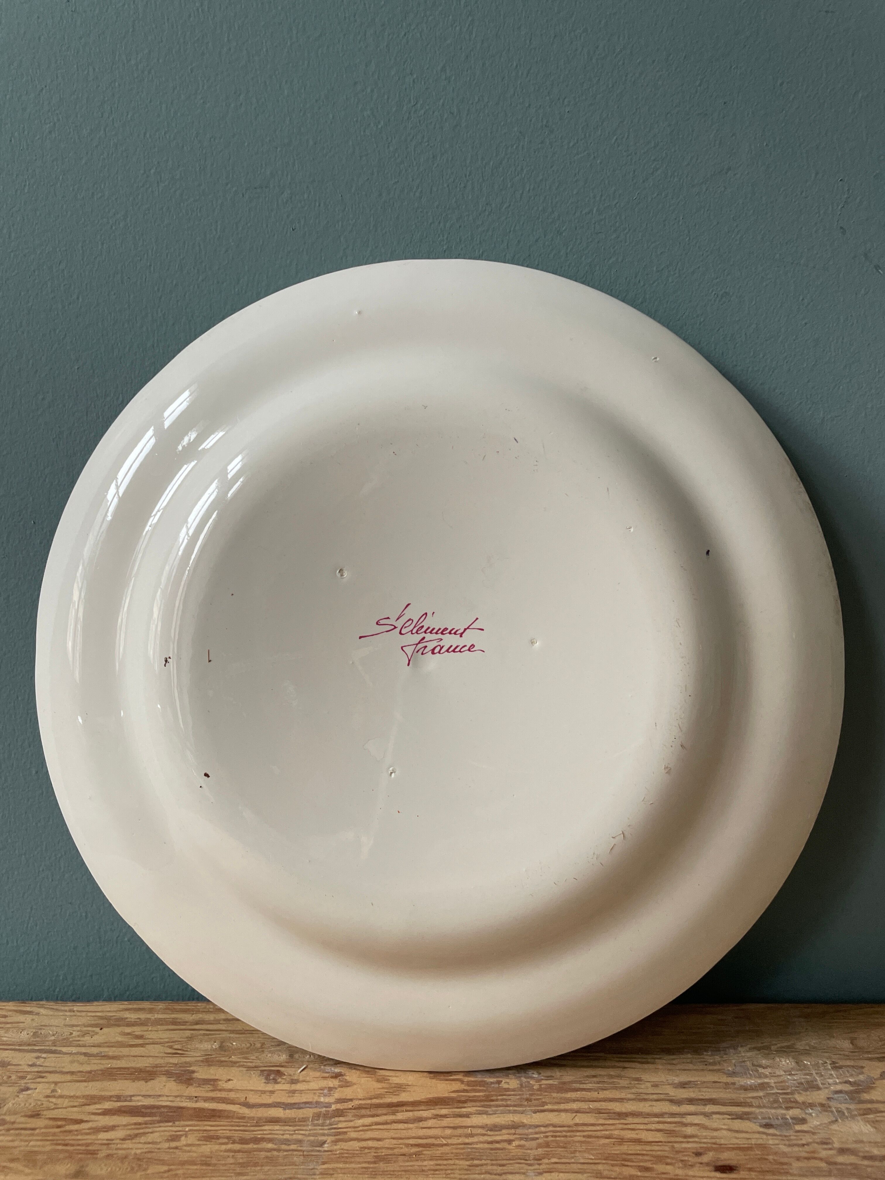 St Clement France plate, floral basket and rooster decoration