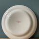 St Clement France plate, floral basket and rooster decoration