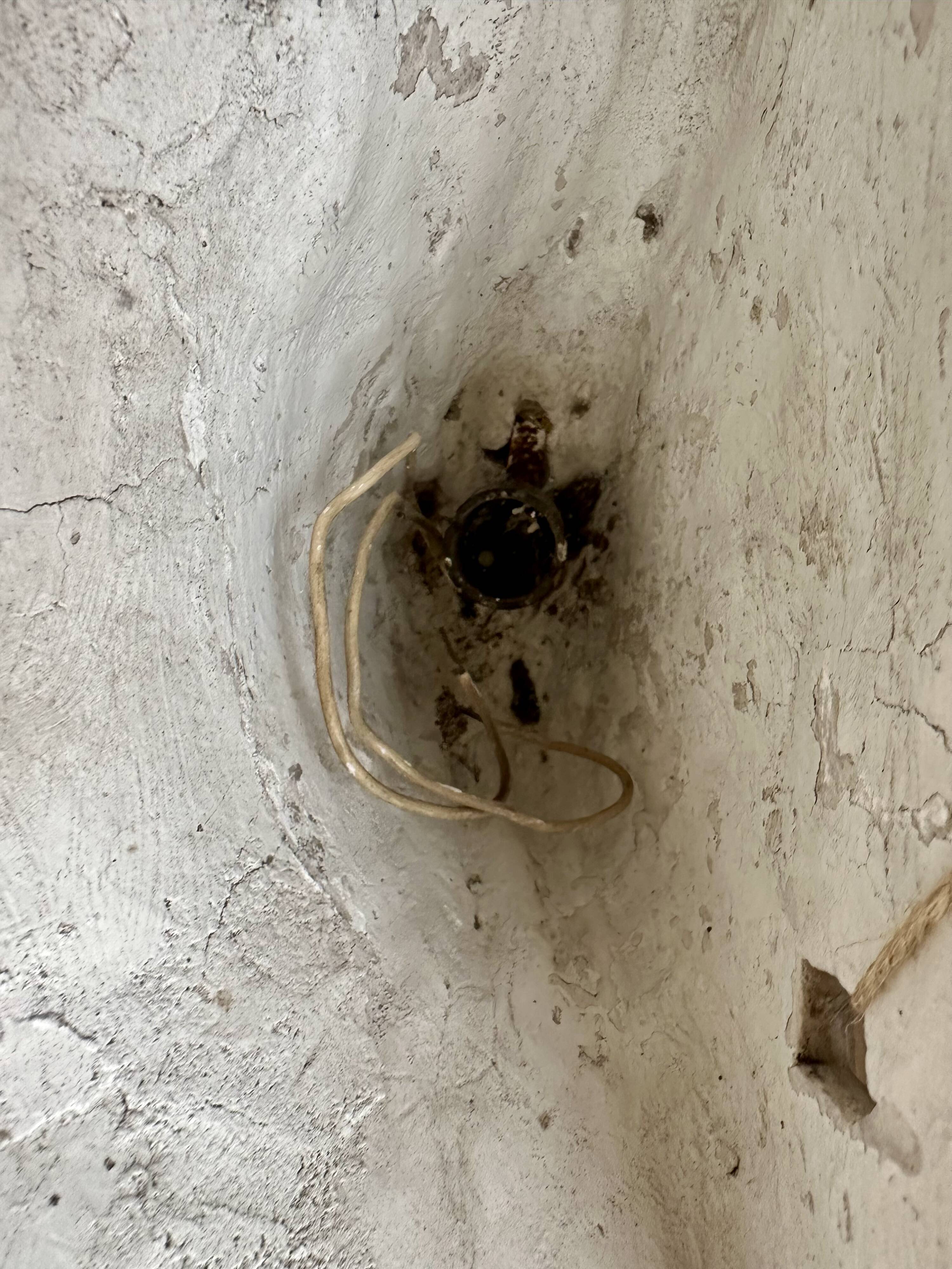 Pair of plaster wall sconces, palmette decoration, 20th century