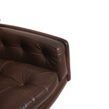 Danish swivel lounge chair in brown leather