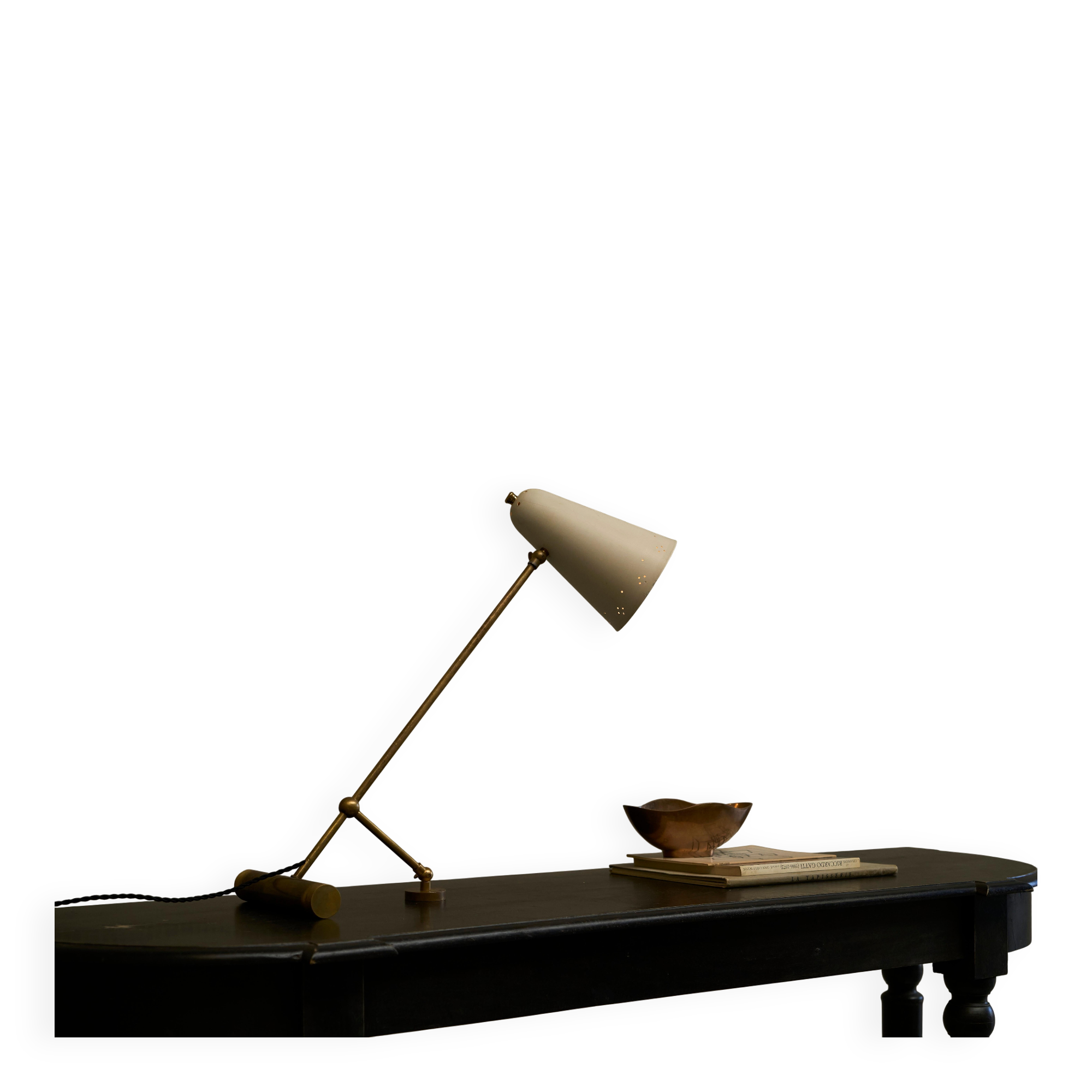 Mid Century adjustable table lamp with perforated shade from the 1950s.