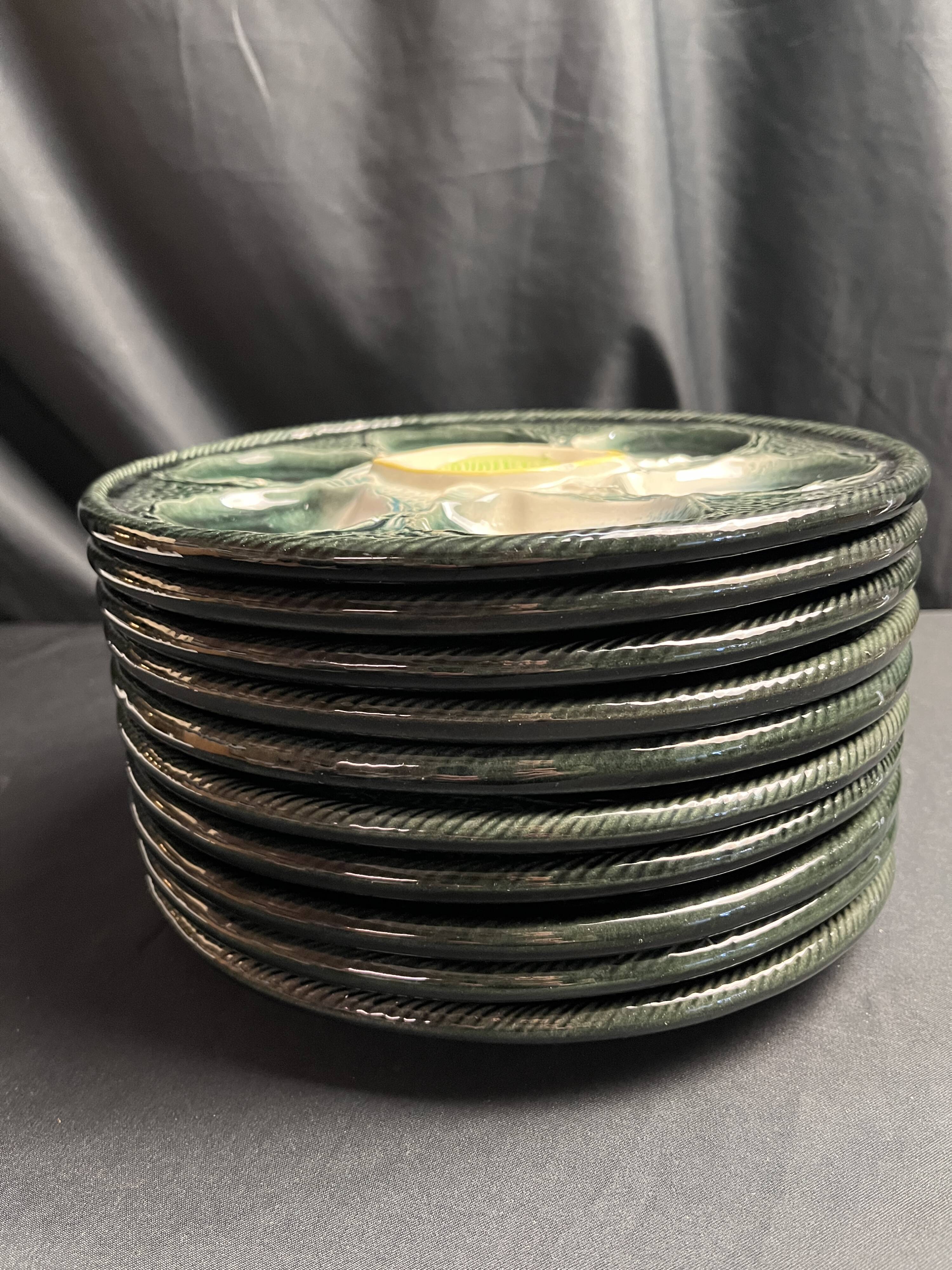 Set of 10 Saint Clément oyster barbotine plates circa 1940