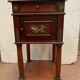Empire style mahogany bedside table