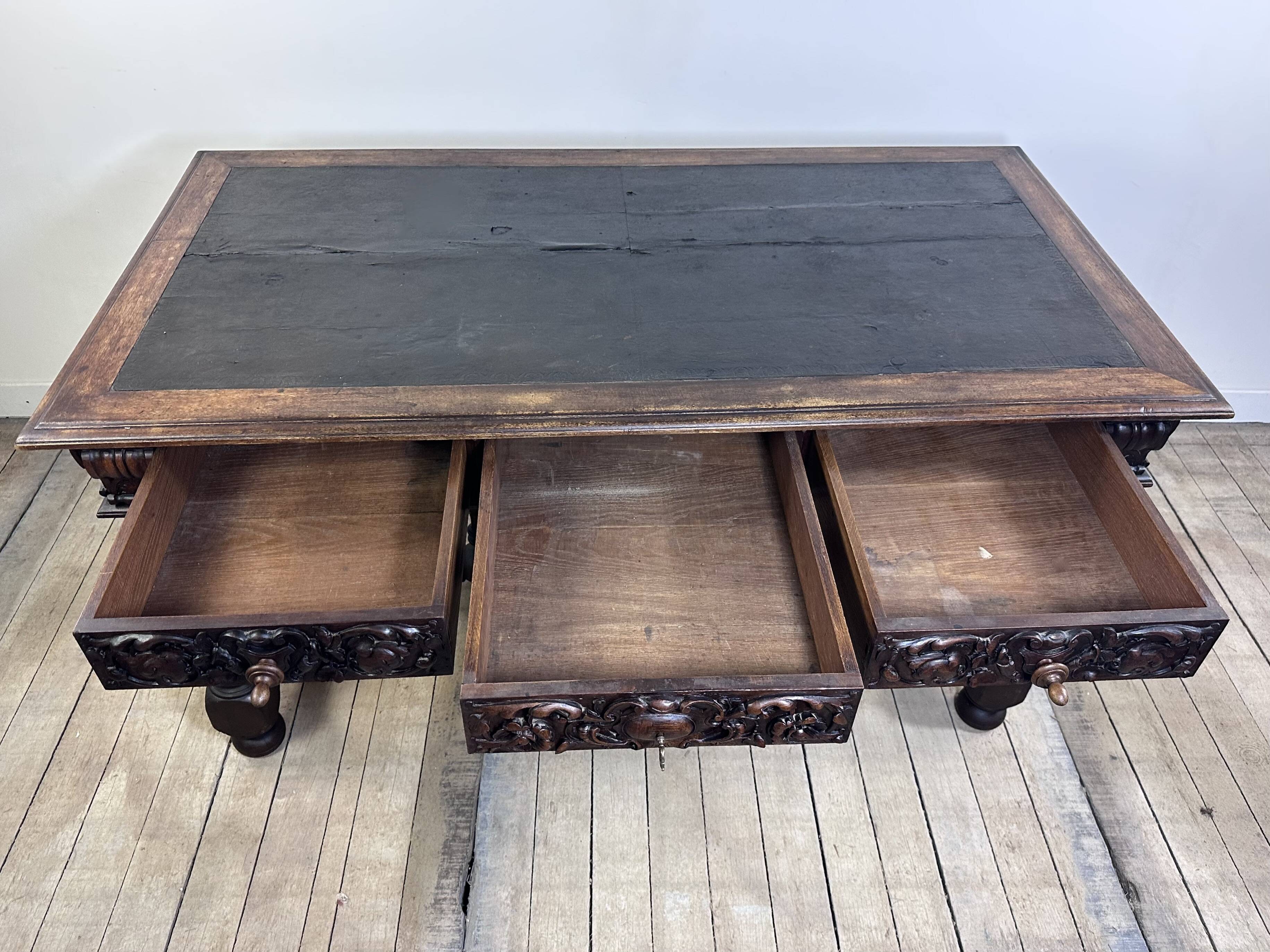 Louis XIII style oak desk stamped Mombro Ainé 19th century