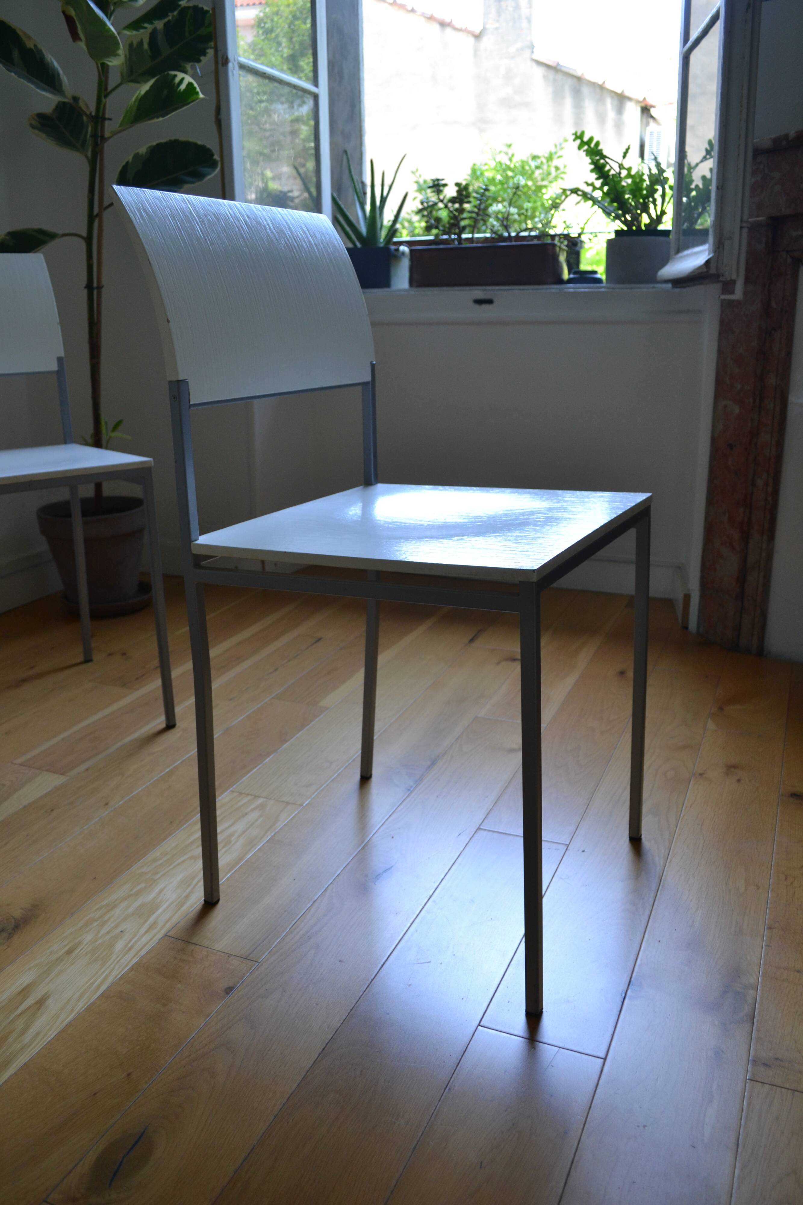 Set of 4 vintage metal and wood chairs from the 1990s.