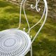 Renovated antique garden furniture in wrought iron, early 20th century.