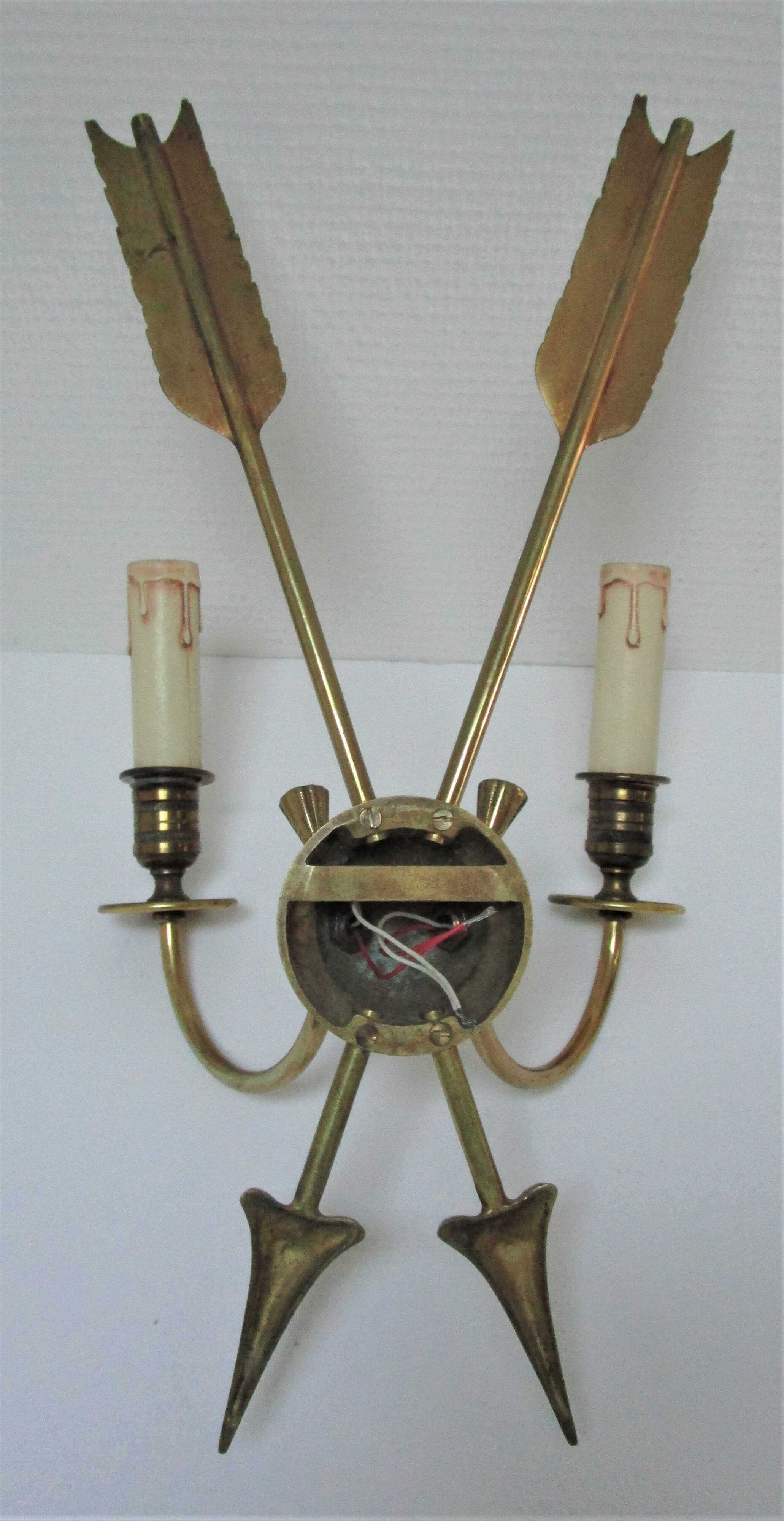 Pair of bronze crossed arrow wall lights Lucien Gau