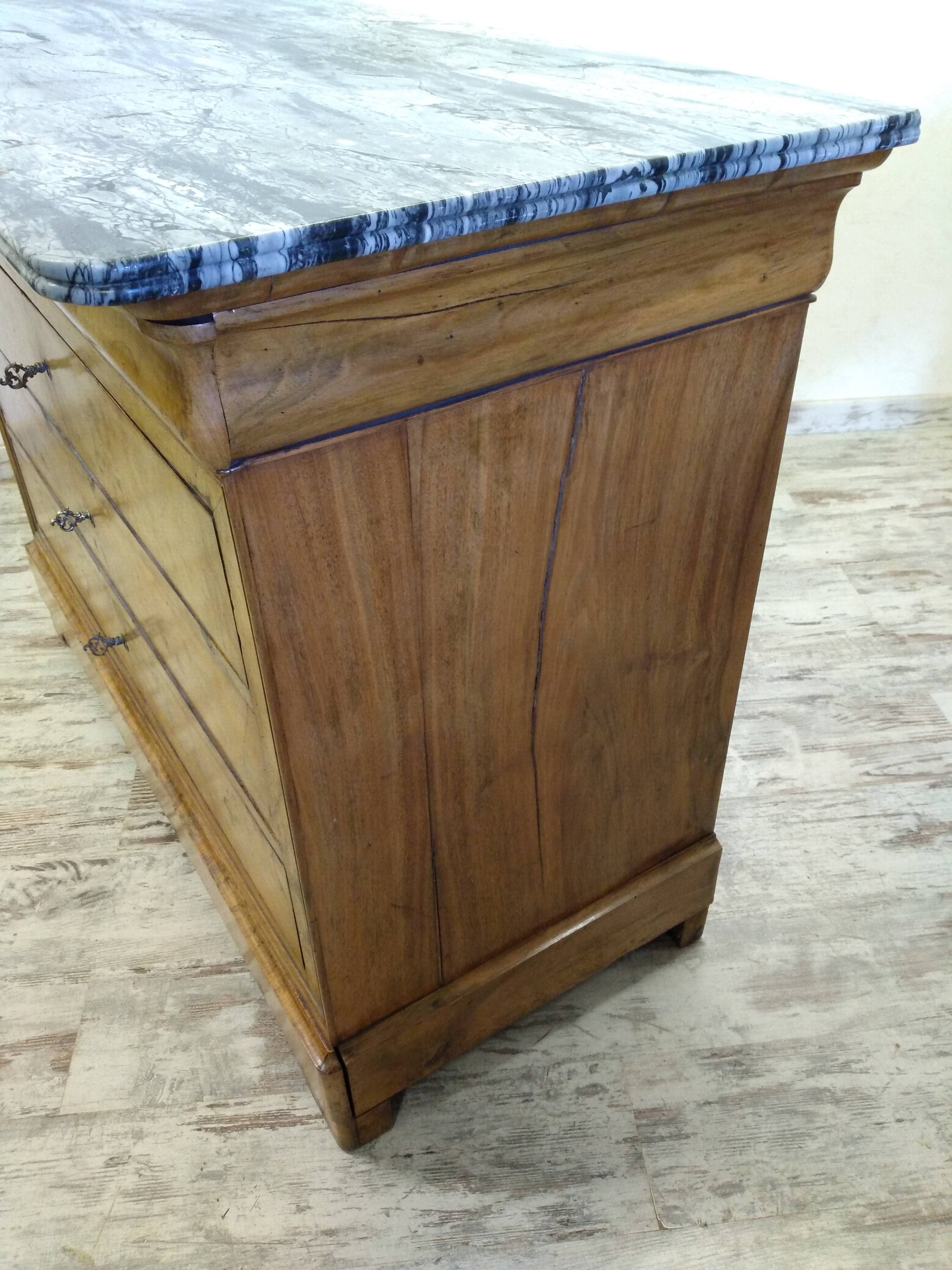 Chest of drawers with marble