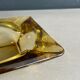 Cendrier vintage en verre jaune