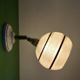 Vintage globe wall light in frosted yellow and gold glass.