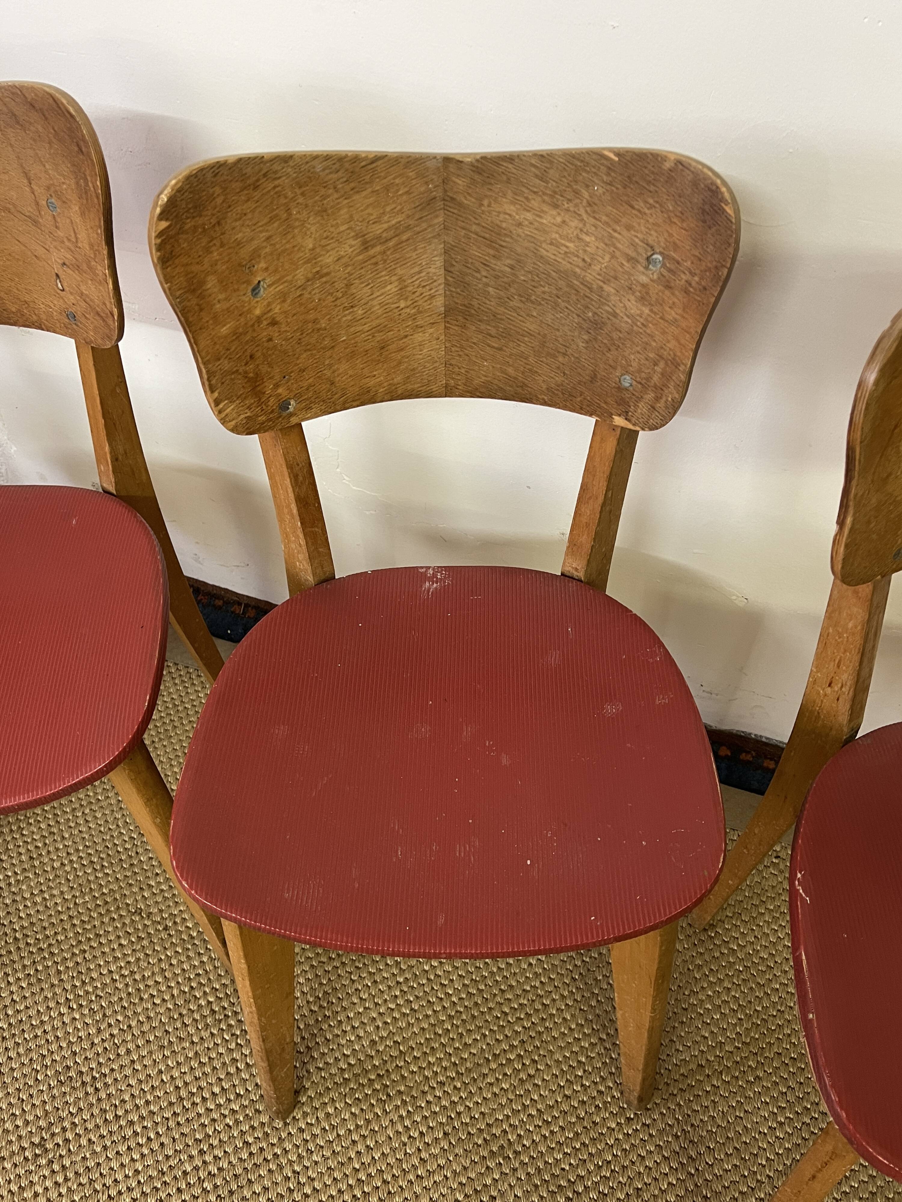 Suite de 4 chaises bistrot en bois vintage