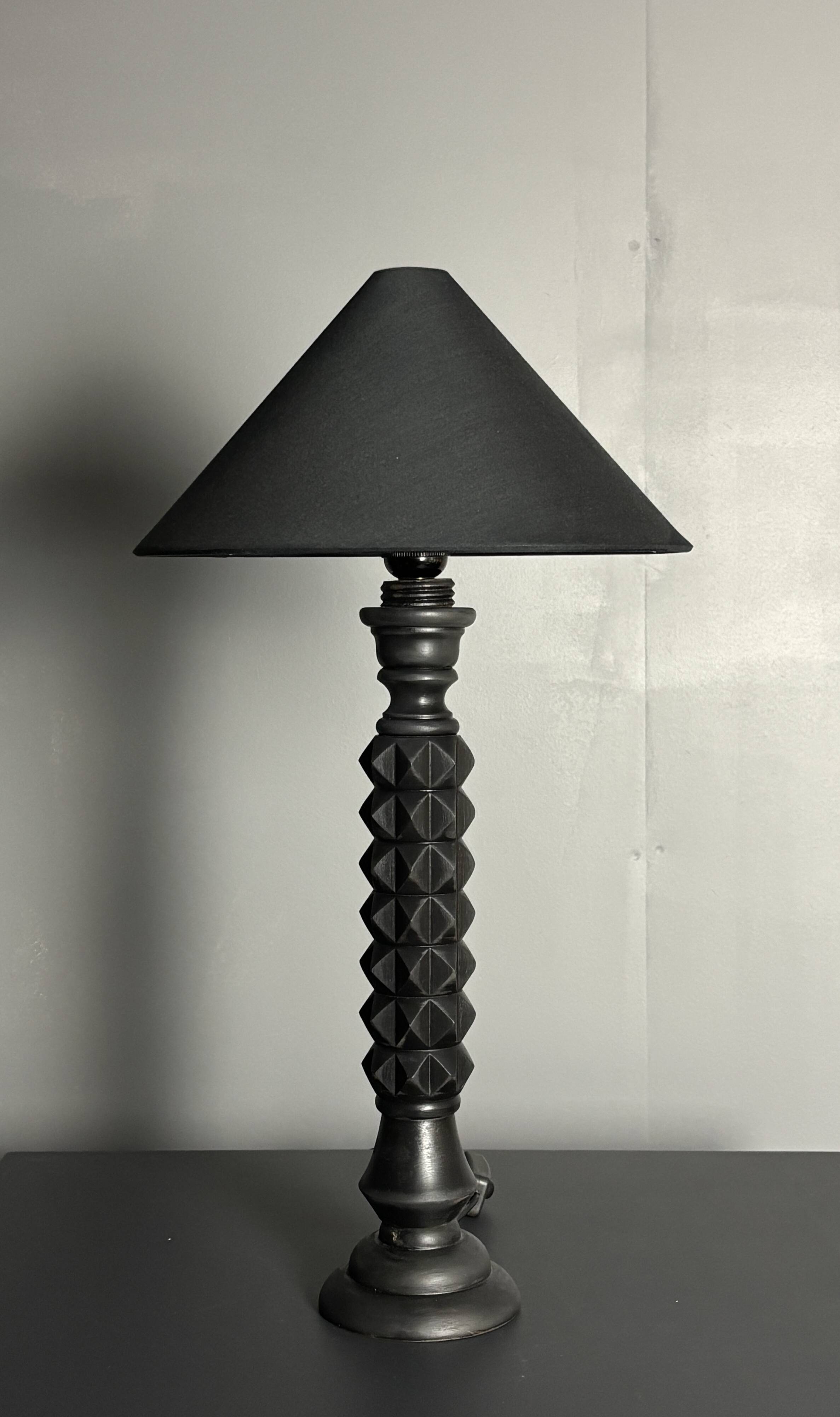 Brutalist wood turned ebonized table lamp in the style of Charles Dudouyt