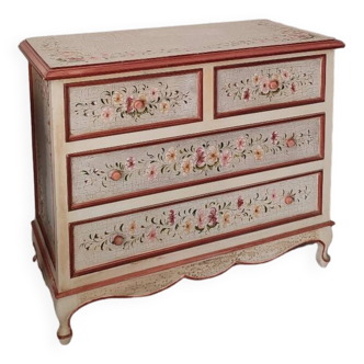 Painted chest of drawers with floral decoration
