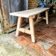 Rustic, raw solid oak bench.