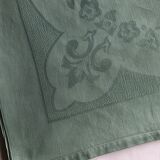Old damask tablecloth tinted in pastel green